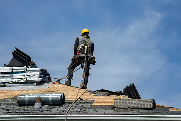 Professional Roofing technician working in Fuquay-Varina, NC